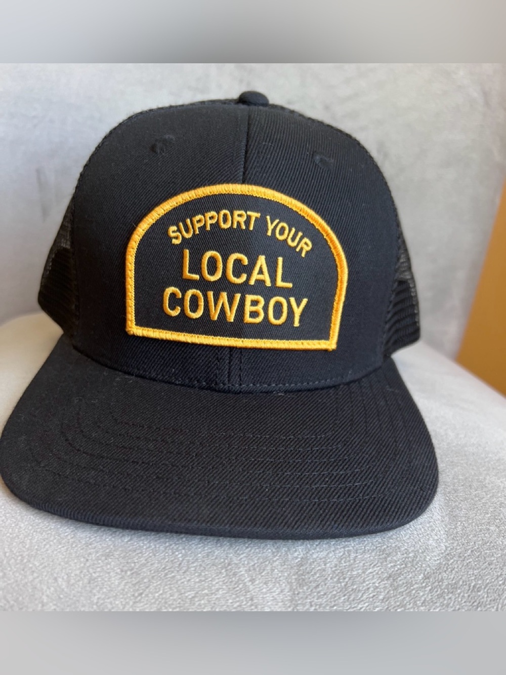 Support Your Local Cowboy Black Trucker Cap with Gold Embroidery